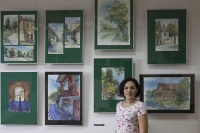 Artyści na tle prac